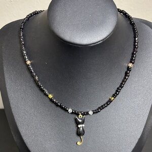 Elegant Black Beaded Necklace with Cat Pendant